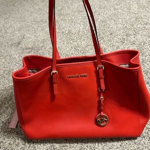 Coral Michael Kors tote/top handle purse.